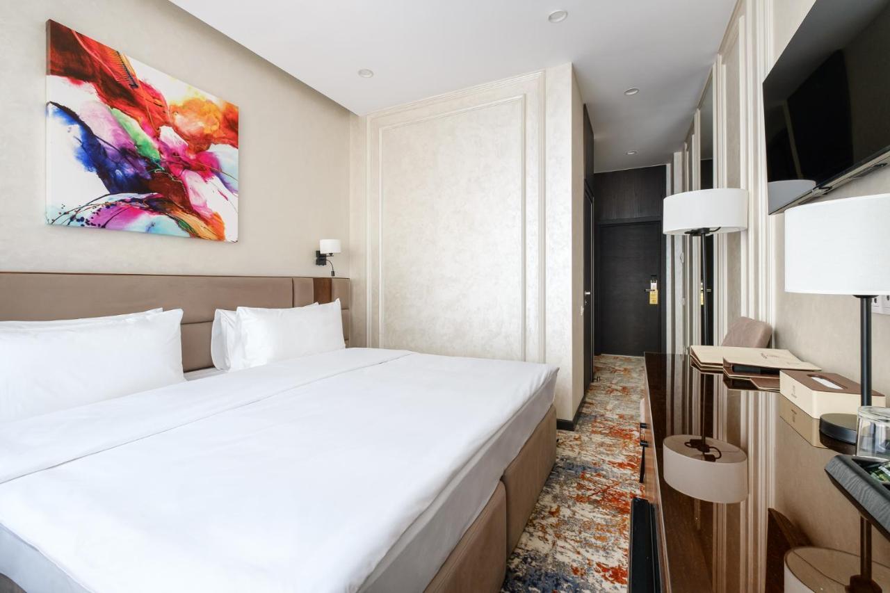 אלמטי Grand Mildom Hotel מראה חיצוני תמונה