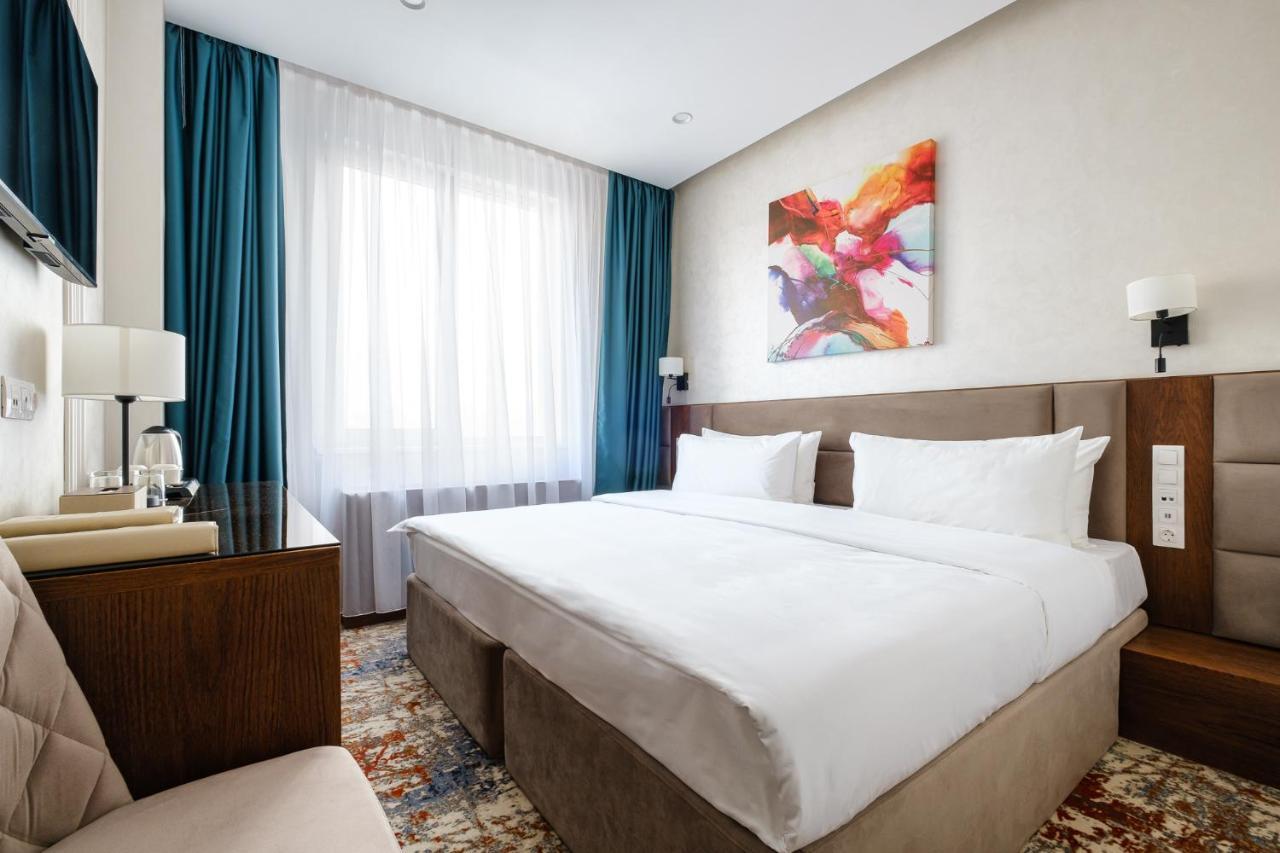 אלמטי Grand Mildom Hotel מראה חיצוני תמונה