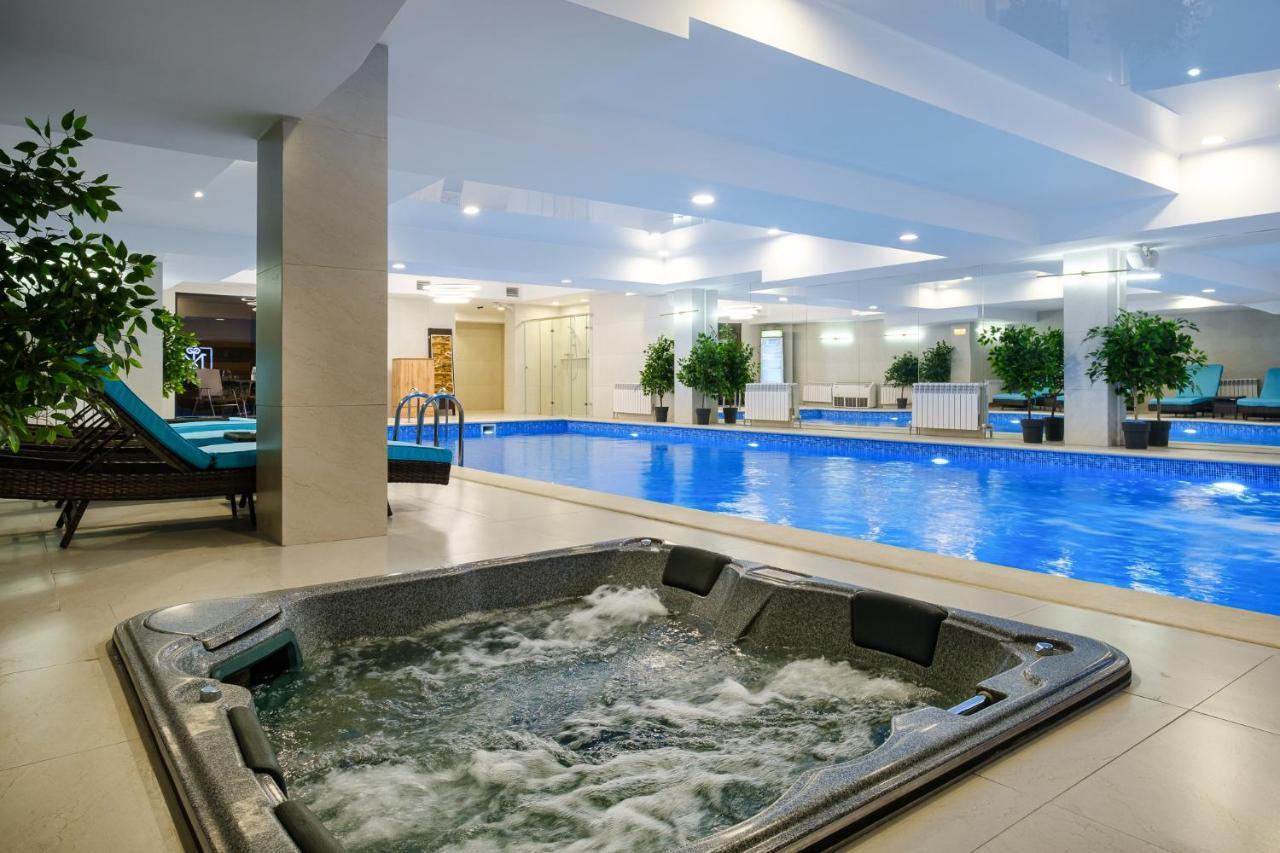 אלמטי Grand Mildom Hotel מראה חיצוני תמונה