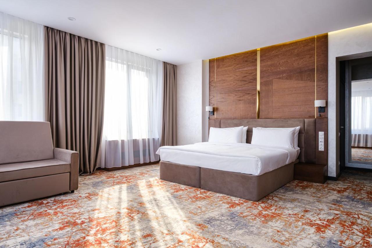 אלמטי Grand Mildom Hotel מראה חיצוני תמונה