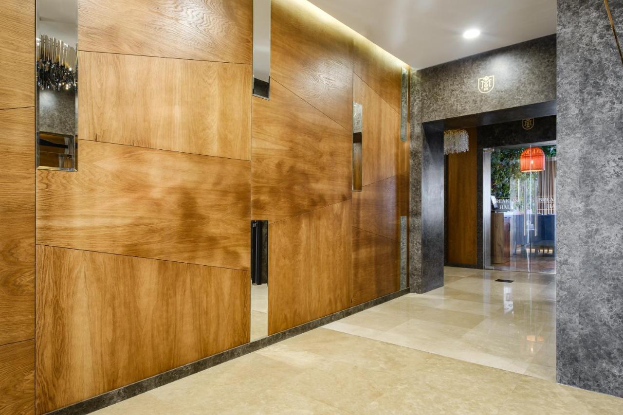 אלמטי Grand Mildom Hotel מראה חיצוני תמונה