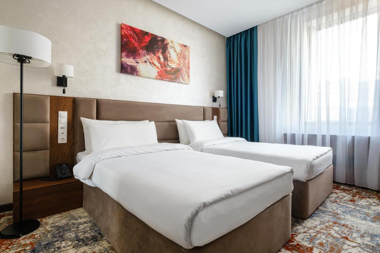 אלמטי Grand Mildom Hotel מראה חיצוני תמונה