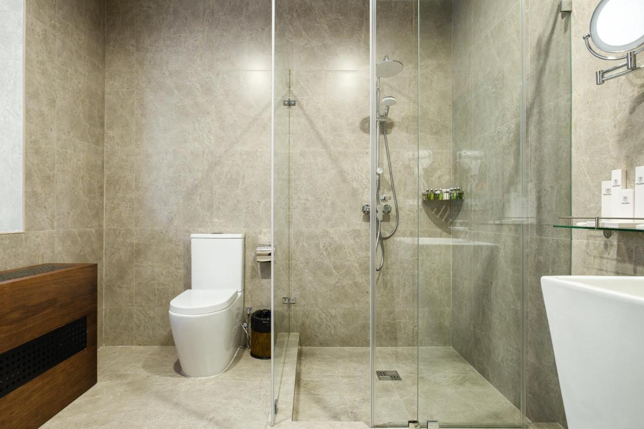 אלמטי Grand Mildom Hotel מראה חיצוני תמונה