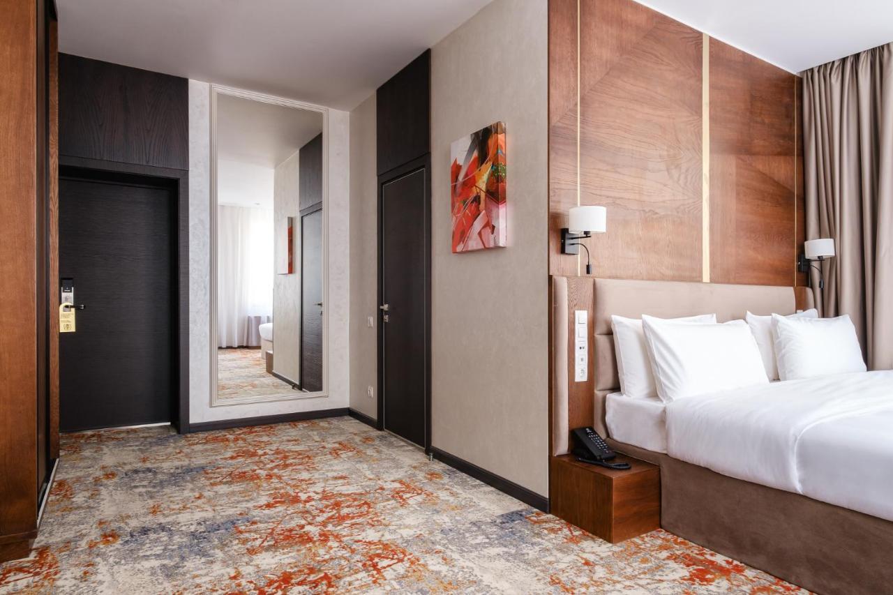 אלמטי Grand Mildom Hotel מראה חיצוני תמונה